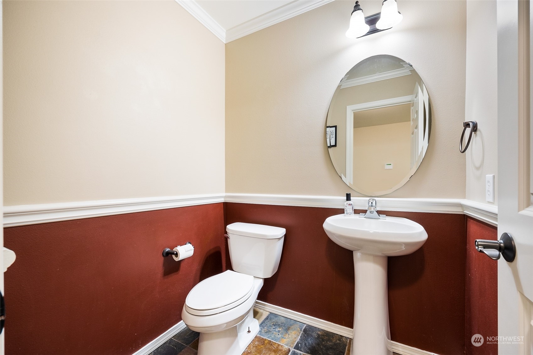 1345 Foreman Road DuPont, WA 98327 - Photo 6 of 34 a bathroom with a toilet sink and mirror