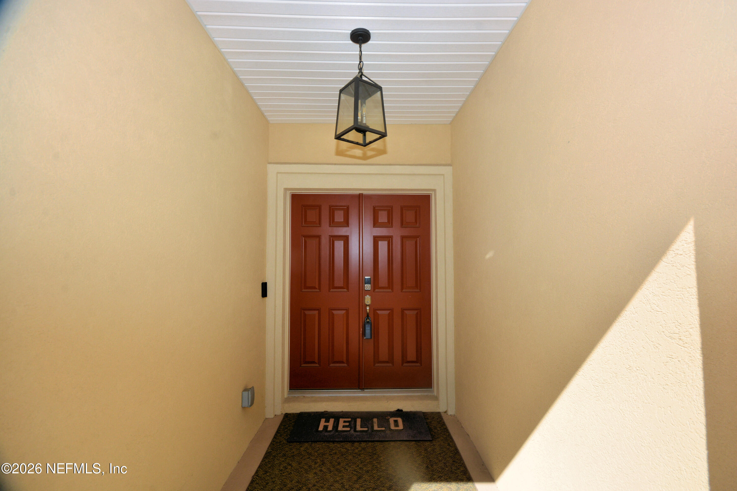 1688 Sanctuary Way Fleming Island, FL 32003 - Photo 3 of 35 a view of a hallway with entryway