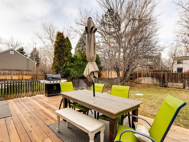 a view of a patio with swimming pool