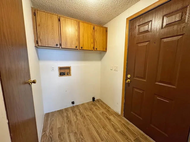 a view of a bedroom from a hallway