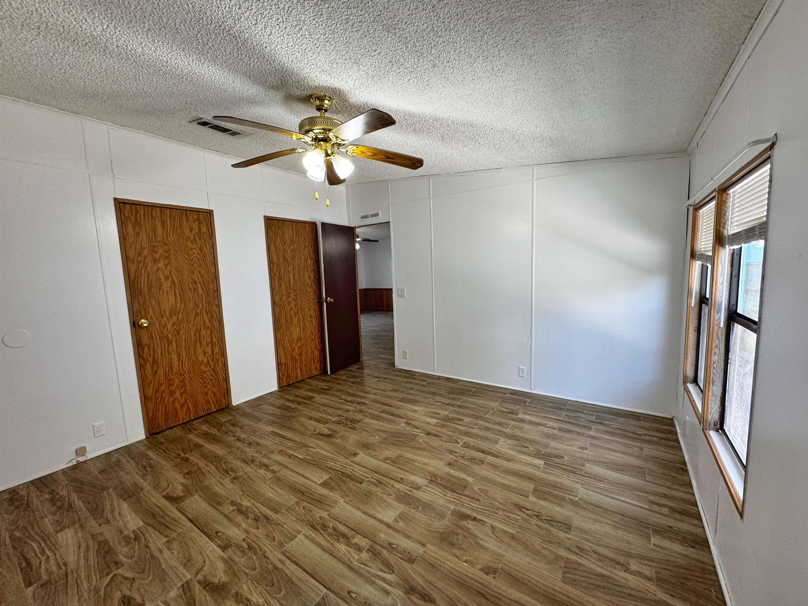680 Coral Circle St. Augustine, FL 32080 - Photo 14 of 30 a view of empty room with wooden floor