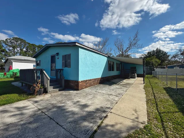 a view of a house with a patio
