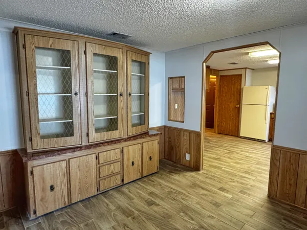 a view of a bathroom with a sink and a mirror