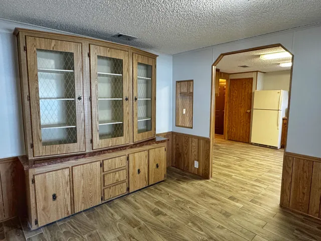 a view of a bathroom with a sink and a mirror