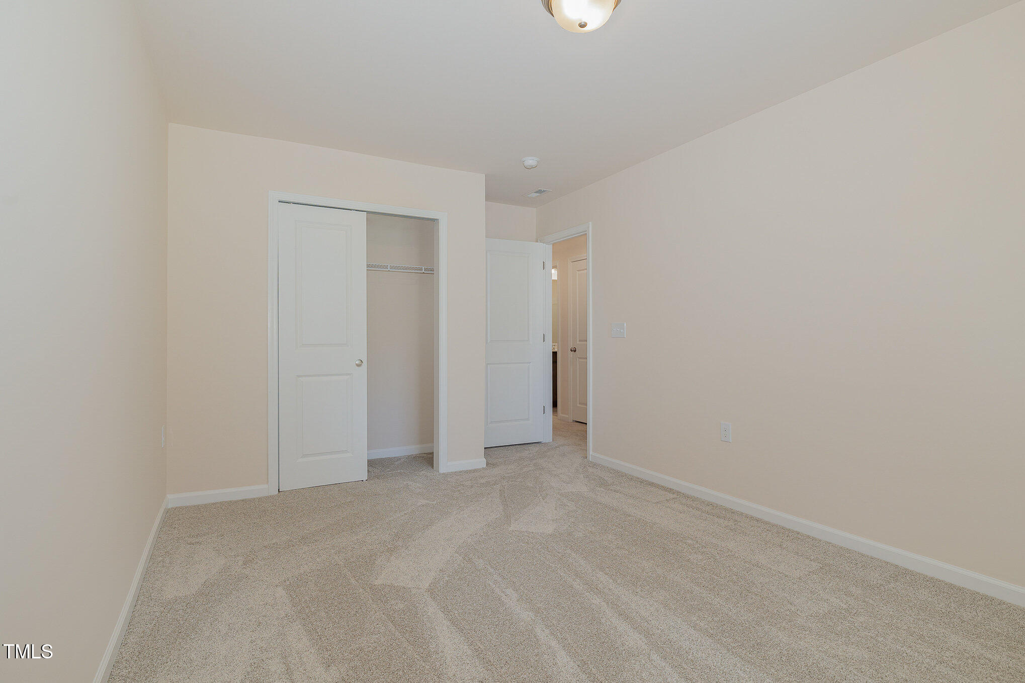 5706 Kalamata Drive Raleigh, NC 27603 - Photo 18 of 25 a view of an empty room