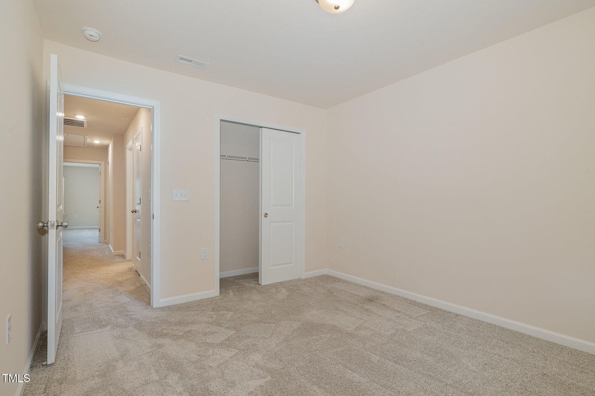 5706 Kalamata Drive Raleigh, NC 27603 - Photo 20 of 25 an empty room with a bathroom