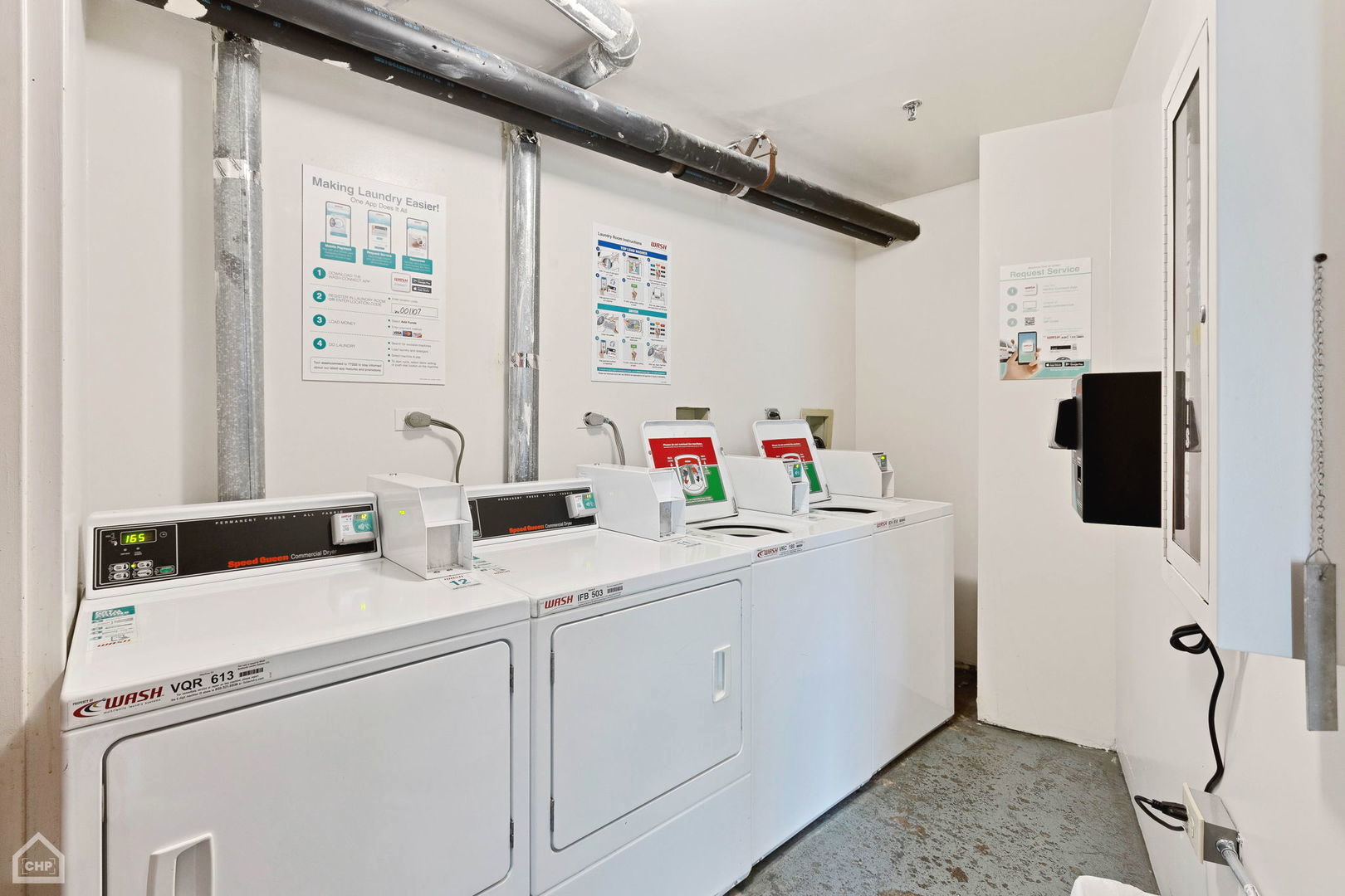 3265 Kirchoff Road, Unit 115 Rolling Meadows, IL 60008 - Photo 18 of 19 a utility room with cabinets washer and dryer