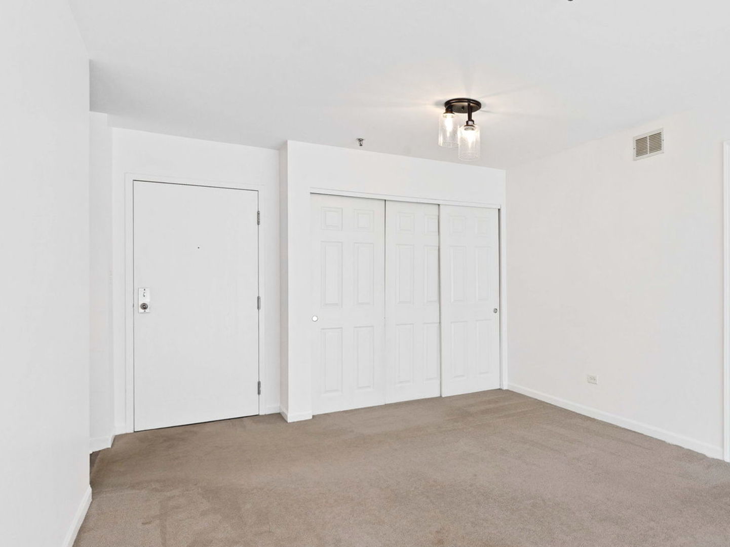 3265 Kirchoff Road, Unit 115 Rolling Meadows, IL 60008 - Photo 5 of 19 a view of an empty room