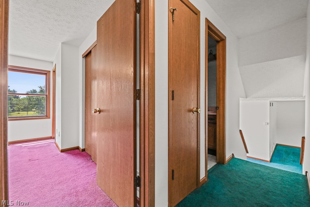 2642 Blake Road Wadsworth, OH 44281 - Photo 22 of 46 Interior hallway featuring wood-finish doors and trim