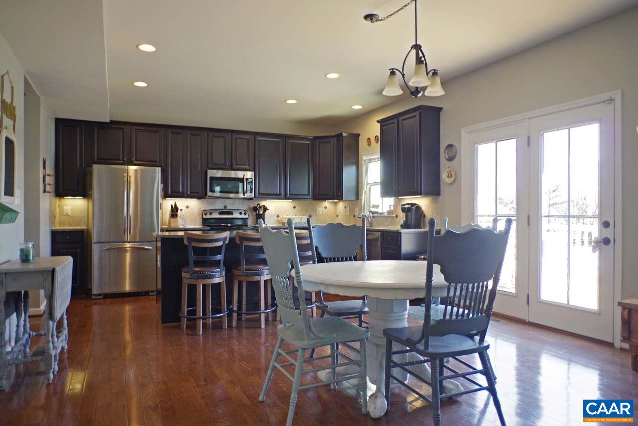 5424 Park Road Crozet, VA 22932 - Photo 12 of 50 a view of a dining room with furniture window and wooden floor