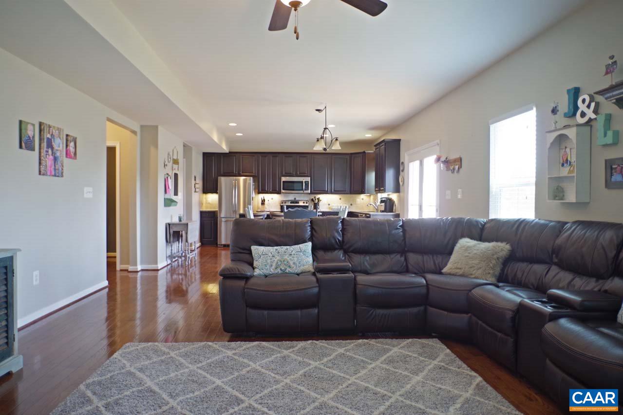 5424 Park Road Crozet, VA 22932 - Photo 19 of 50 a living room with furniture and a chandelier