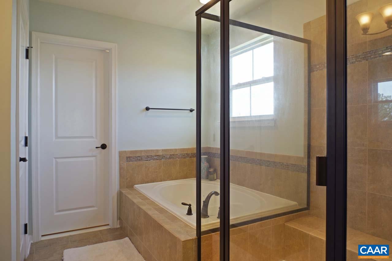 5424 Park Road Crozet, VA 22932 - Photo 29 of 50 a bathroom with a tub and shower