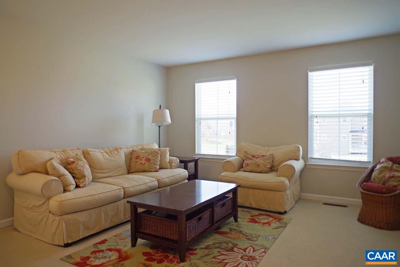 5424 Park Road Crozet, VA 22932 - Photo 32 of 50 a living room with furniture and a large window