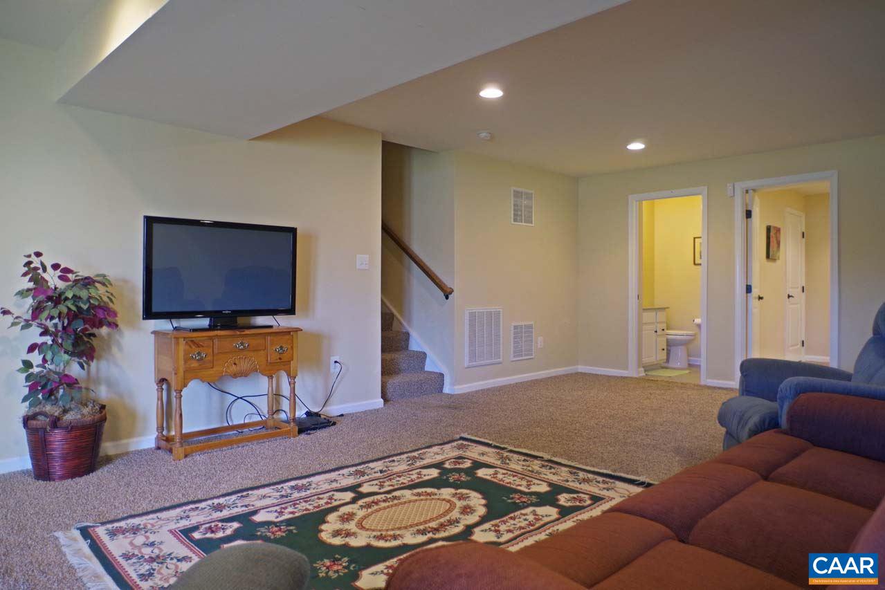 5424 Park Road Crozet, VA 22932 - Photo 41 of 50 a living room with furniture and a flat screen tv