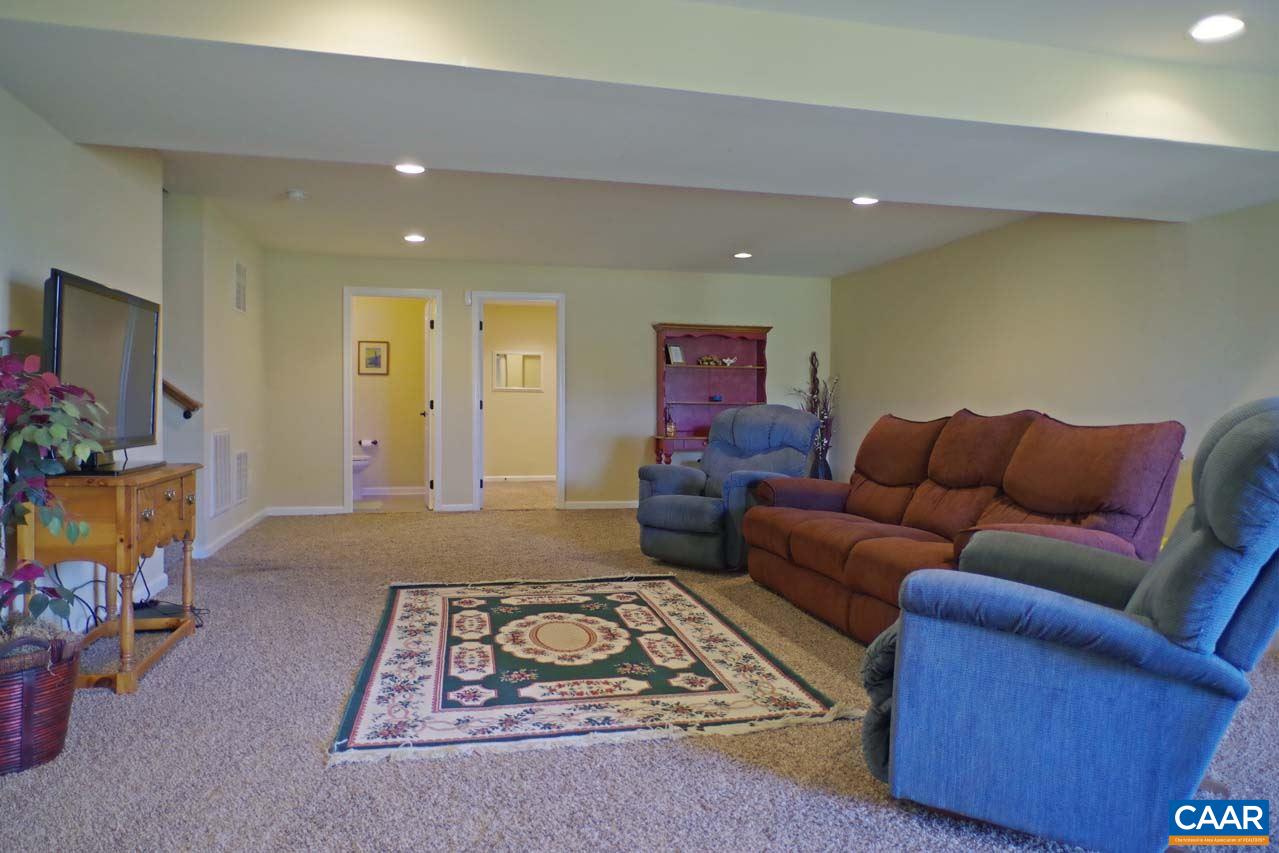 5424 Park Road Crozet, VA 22932 - Photo 44 of 50 a living room with furniture and a flat screen tv