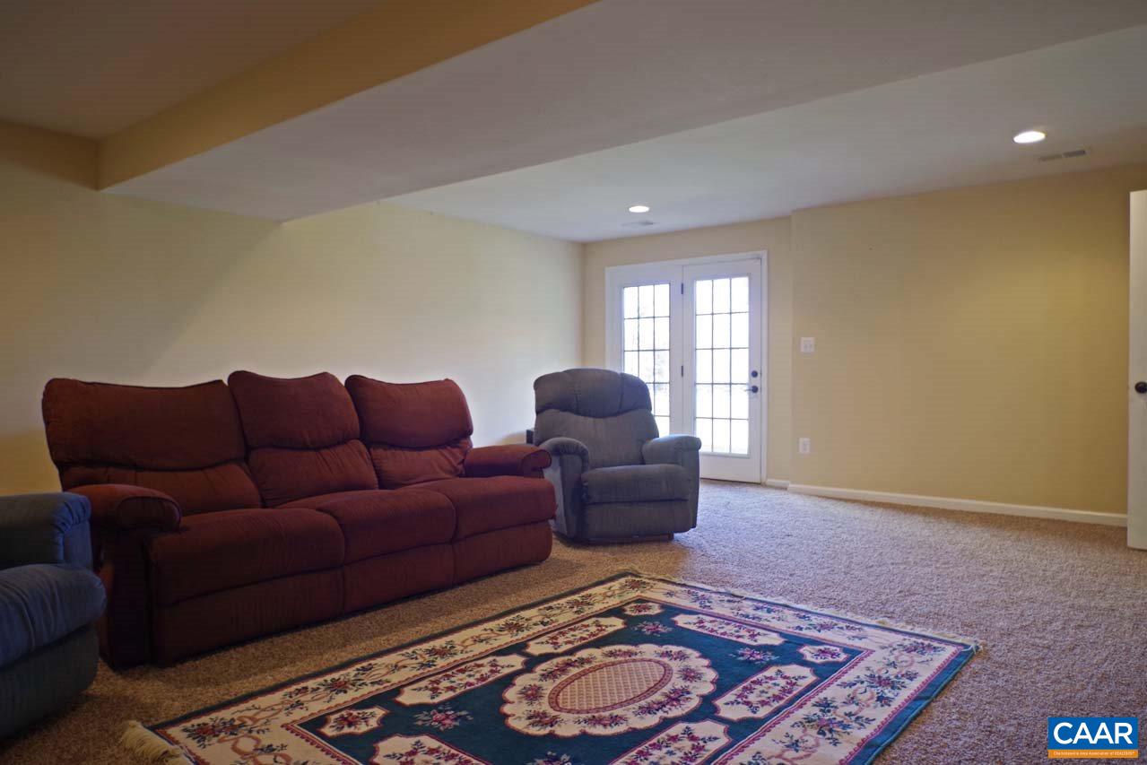 5424 Park Road Crozet, VA 22932 - Photo 46 of 50 a living room with furniture and a rug