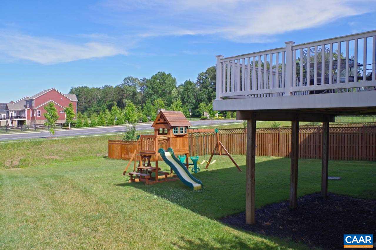 5424 Park Road Crozet, VA 22932 - Photo 47 of 50 a view of a deck with a table and chairs