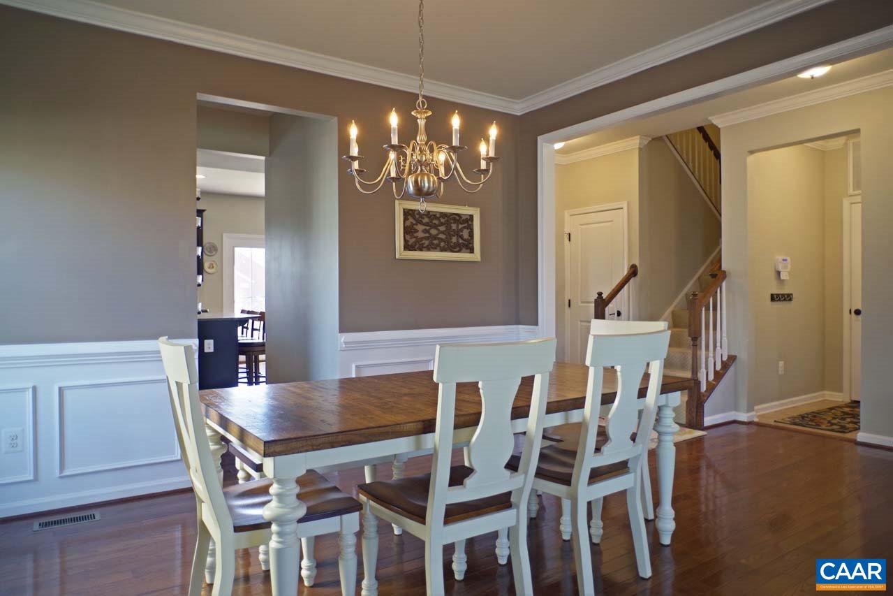 5424 Park Road Crozet, VA 22932 - Photo 9 of 50 a view of a dining room with furniture and chandelier