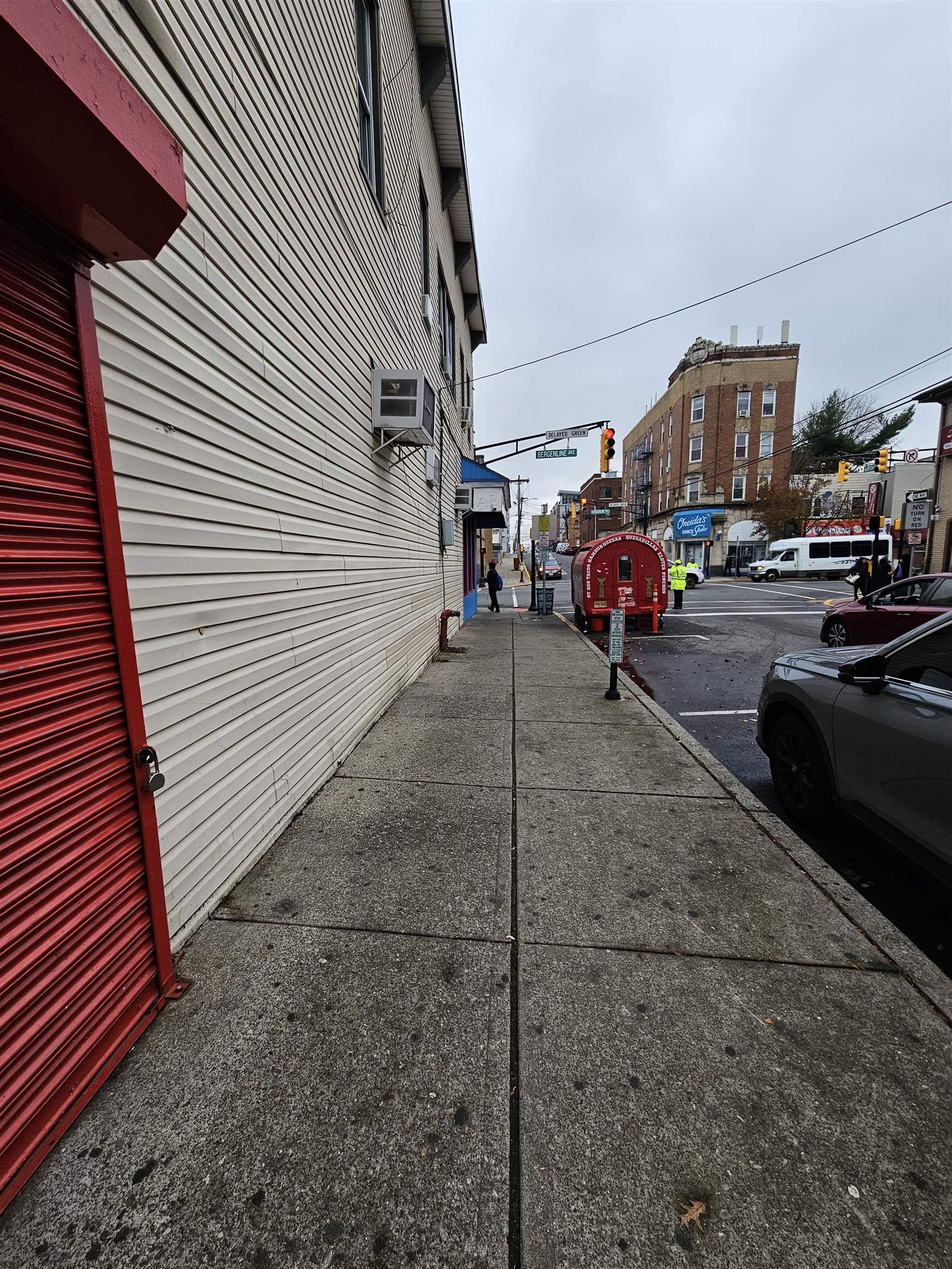 a view of cars parked in front of a house