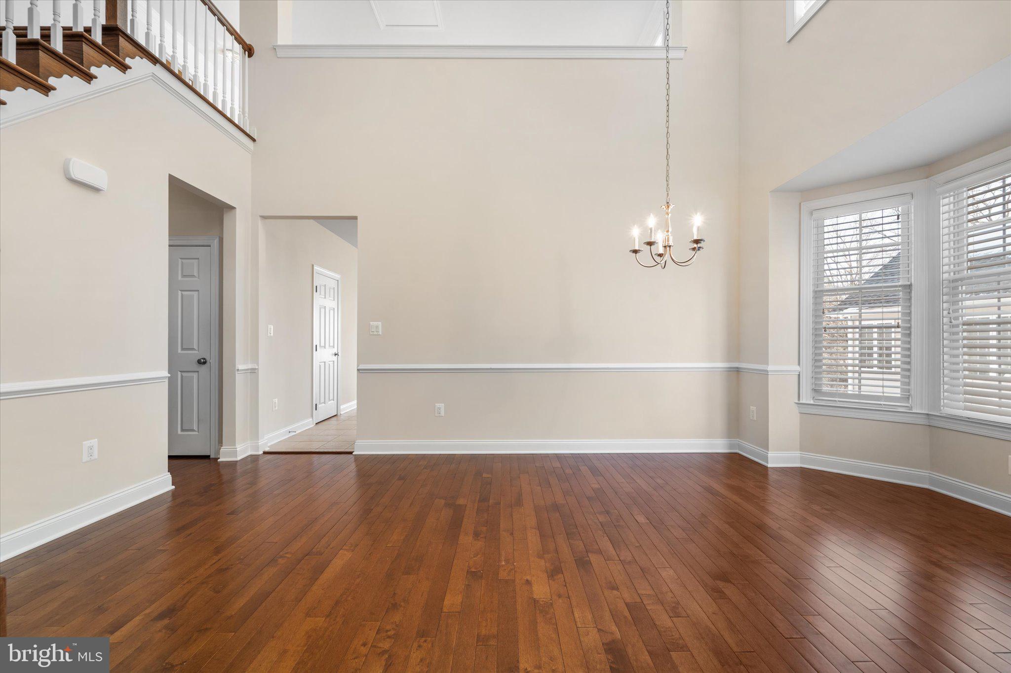 22990 Weybridge Square Ashburn, VA 20148 - Photo 15 of 66 Two Story Dining Room