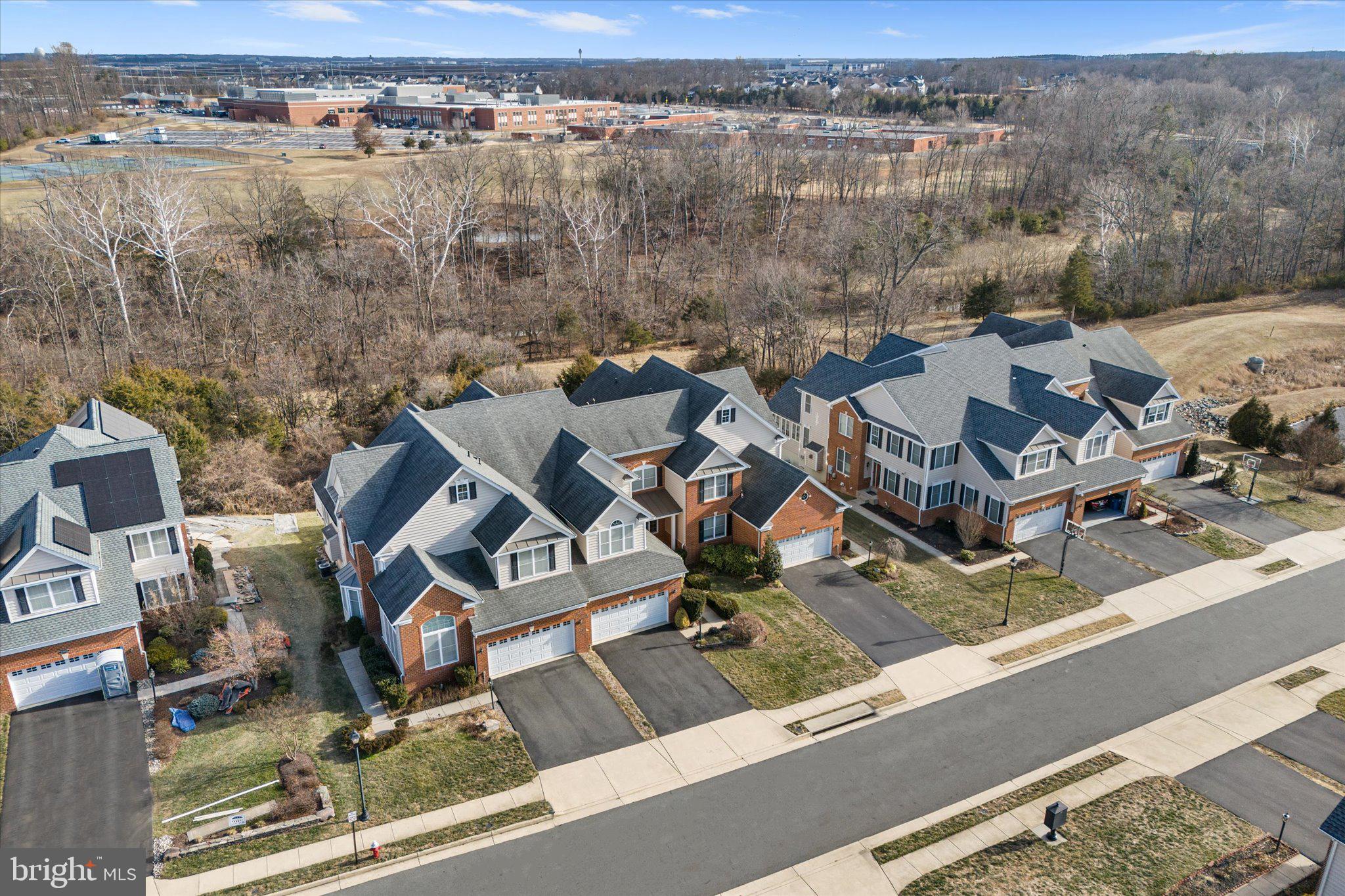 22990 Weybridge Square Ashburn, VA 20148 - Photo 2 of 66 Aerial View backing to Trees