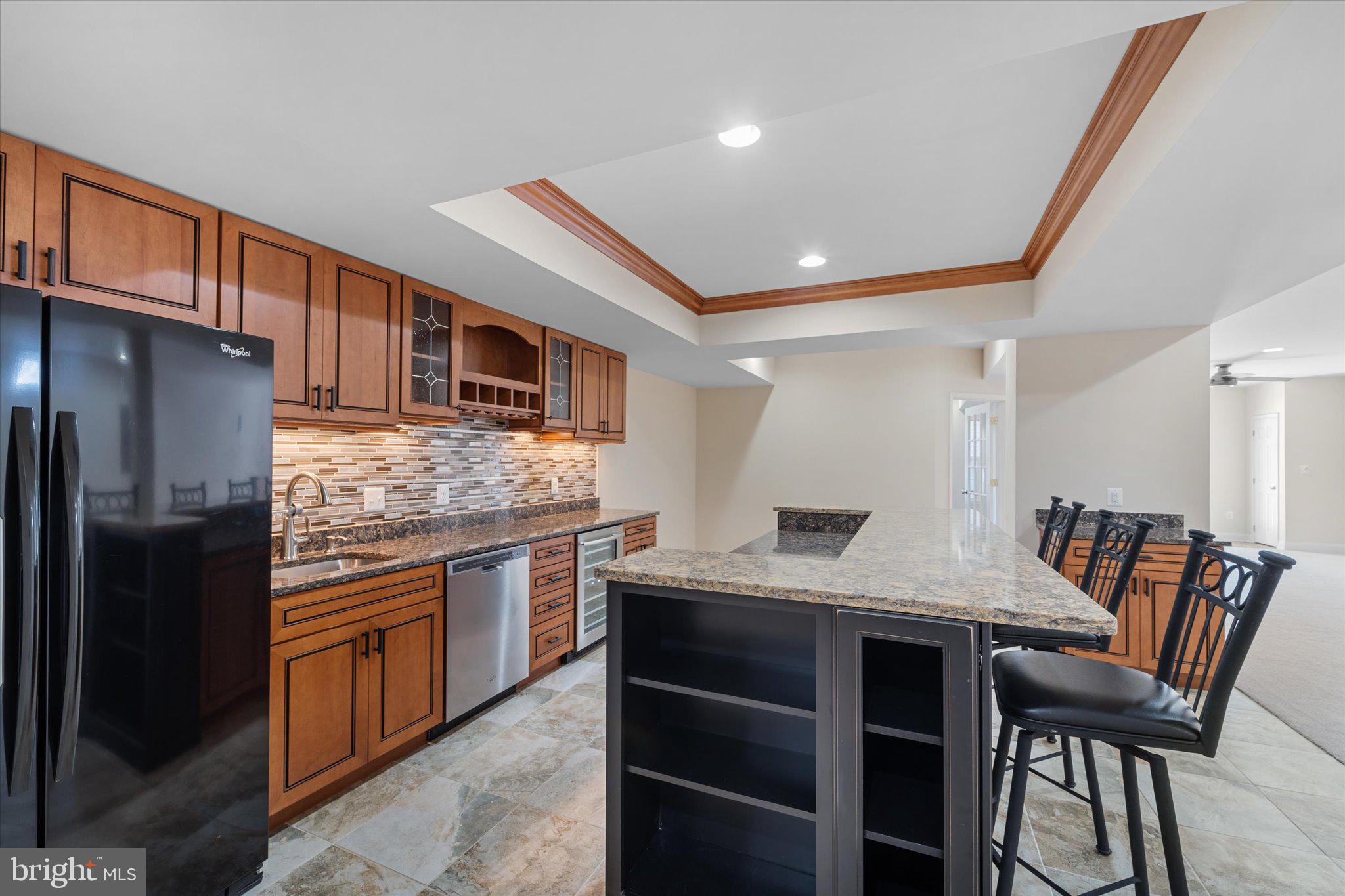 22990 Weybridge Square Ashburn, VA 20148 - Photo 41 of 66 Lower Level Bar