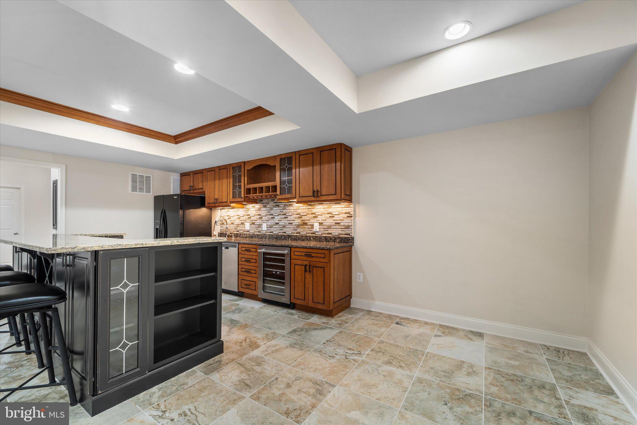 22990 Weybridge Square Ashburn, VA 20148 - Photo 42 of 66 Lower Level Bar