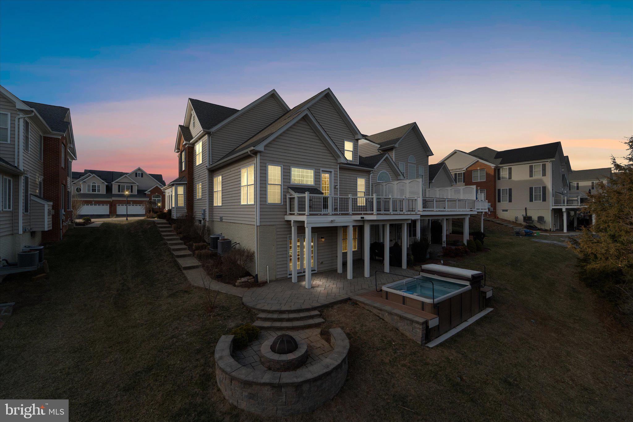 22990 Weybridge Square Ashburn, VA 20148 - Photo 50 of 66 Rear View of Home - Twilight