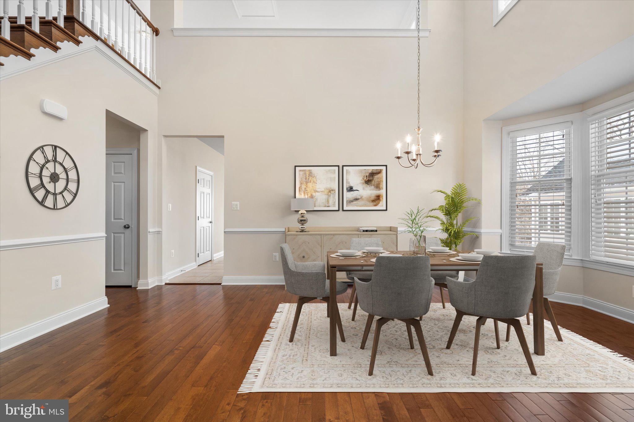 22990 Weybridge Square Ashburn, VA 20148 - Photo 5 of 66 Two Story Dining Room - Virtually Staged
