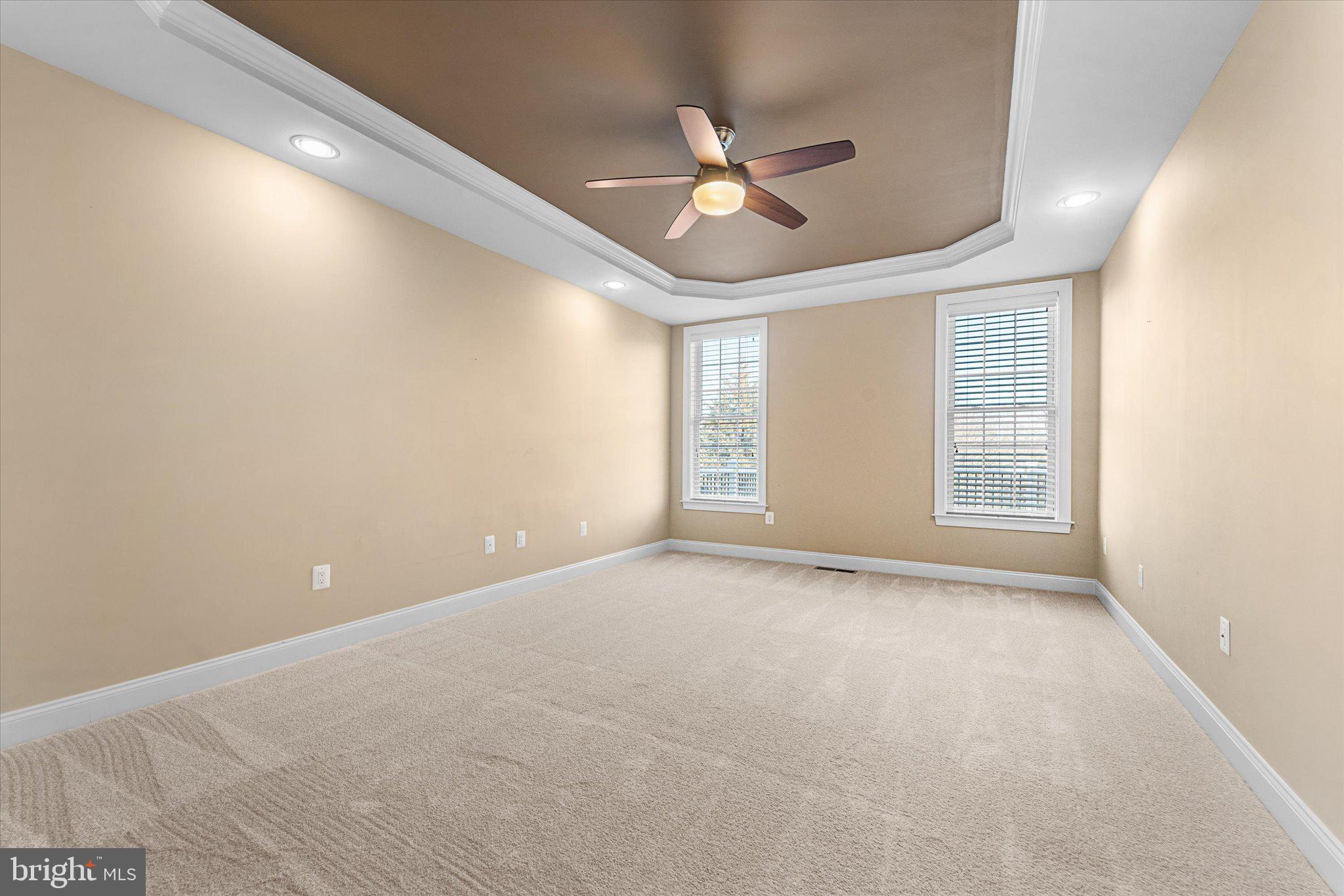 22990 Weybridge Square Ashburn, VA 20148 - Photo 10 of 66 Main Level Primary Bedroom - Tray Ceilings