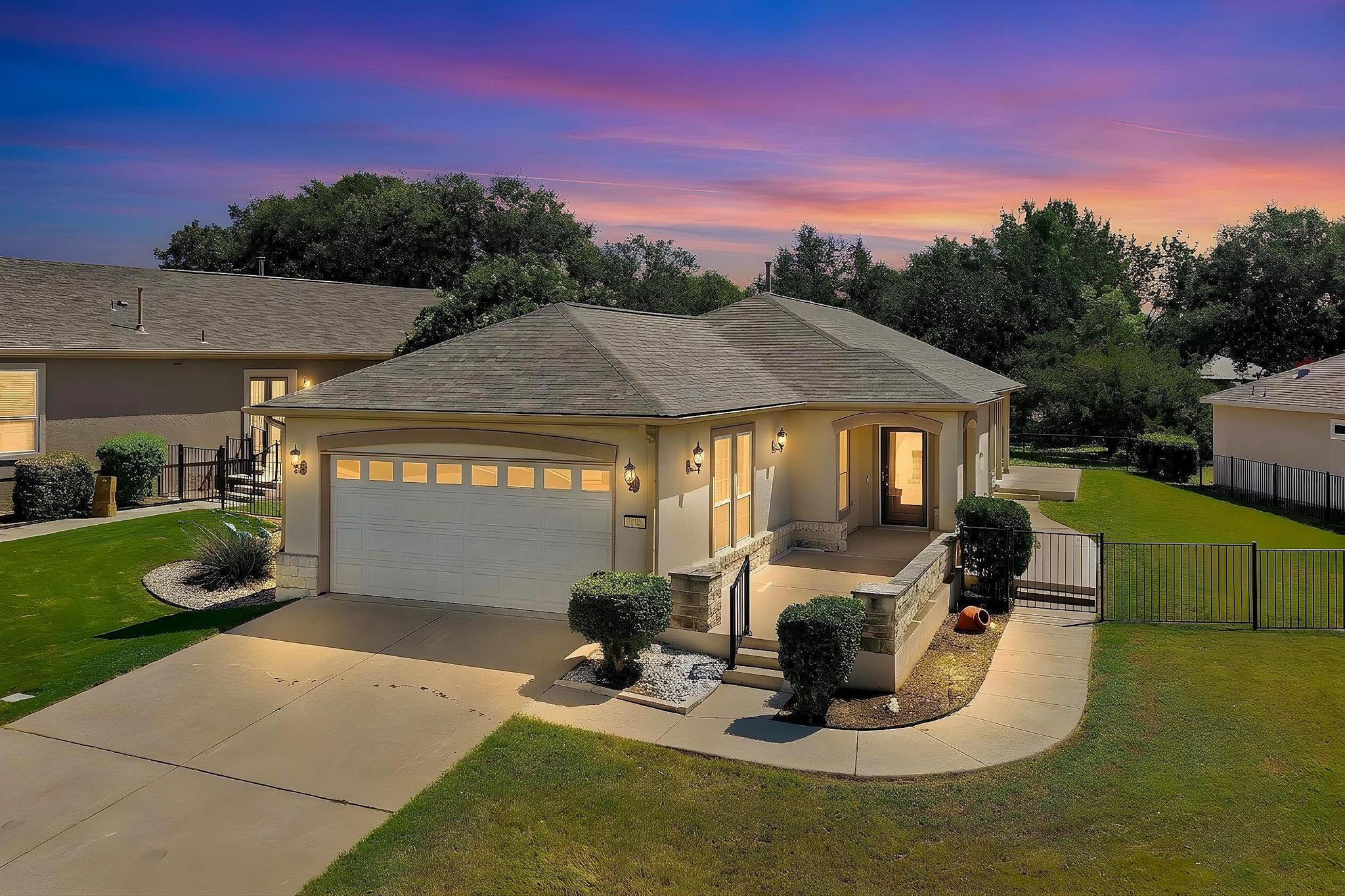520 Mill Pond Path Georgetown, TX 78633 - Photo 1 of 38 The welcoming front entrance leads to a well-maintained home with an attached garage and manicured landscaping.
