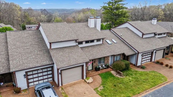 an aerial view of a house with garden