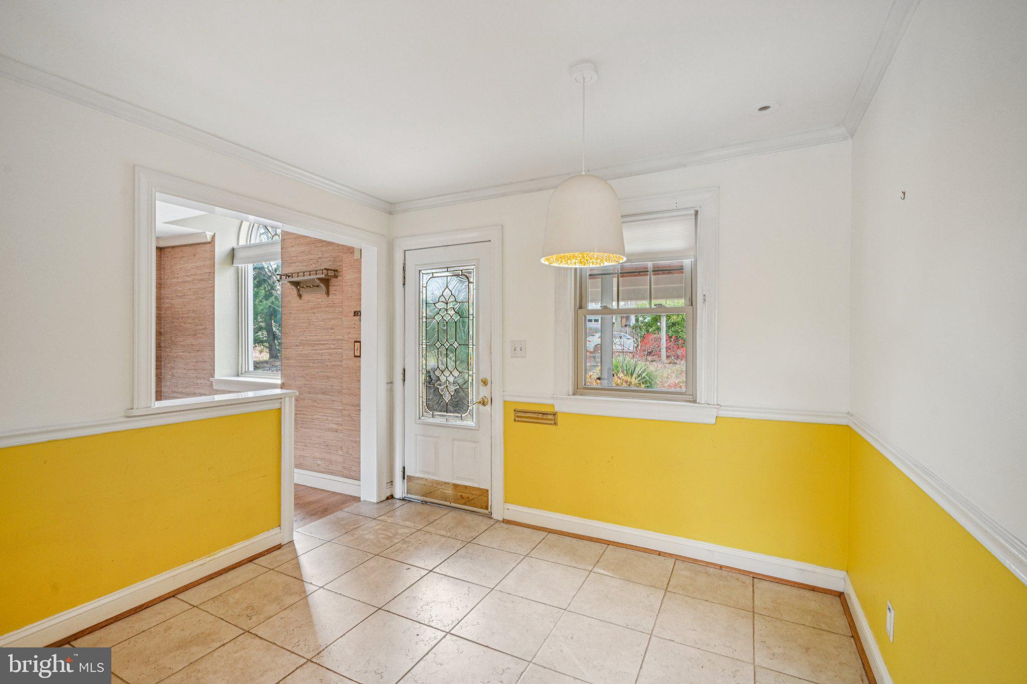 1607 Silverside Road Wilmington, DE 19810 - Photo 11 of 36 a view of an empty room with windows