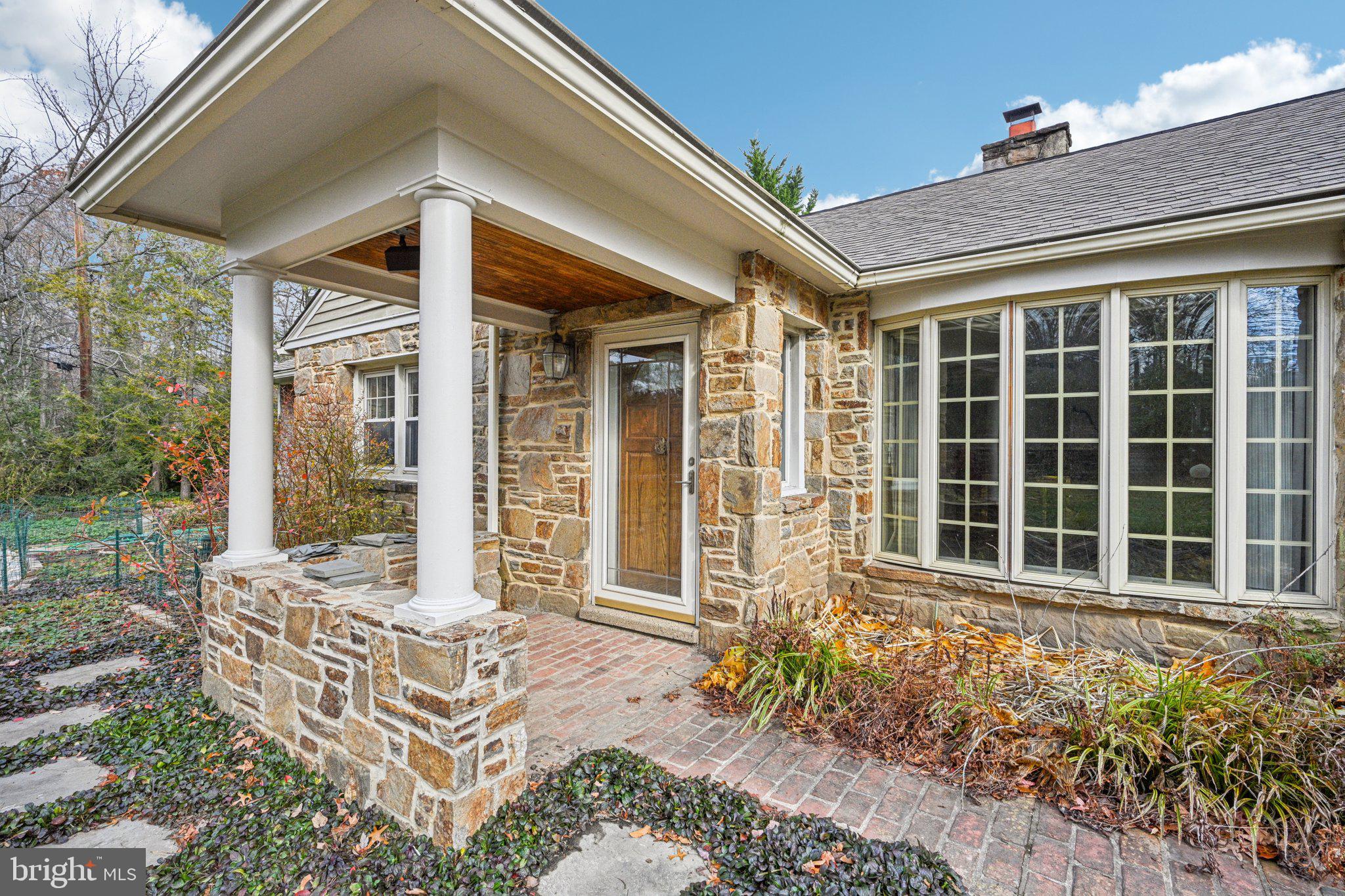 1607 Silverside Road Wilmington, DE 19810 - Photo 2 of 36 a front view of a house with a porch