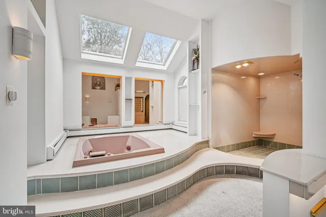 a living room with granite countertop and furniture
