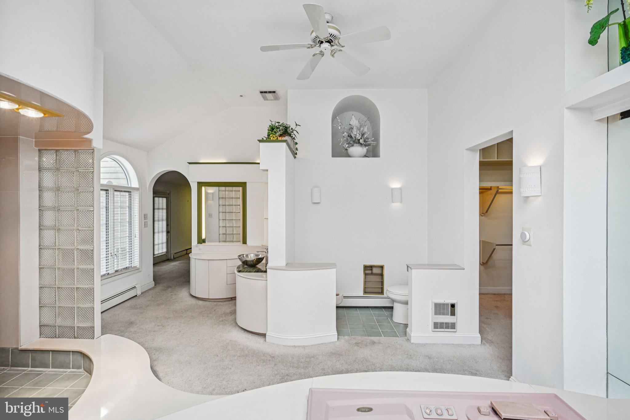 1607 Silverside Road Wilmington, DE 19810 - Photo 22 of 36 a living room with furniture and a window