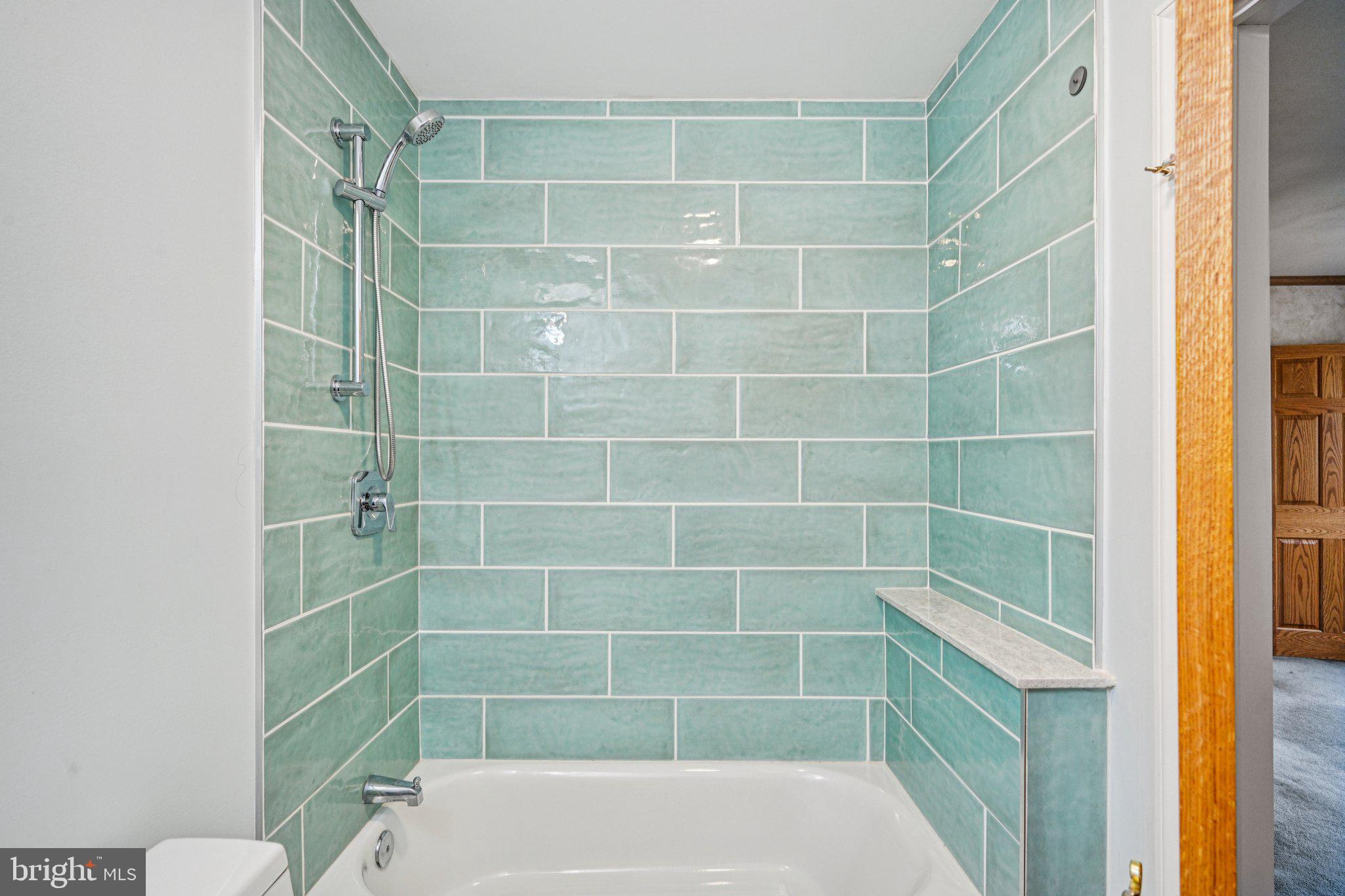 1607 Silverside Road Wilmington, DE 19810 - Photo 28 of 36 a bathroom with a bathtub