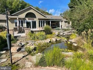 1607 Silverside Road Wilmington, DE 19810 - Photo 32 of 36 a front view of a house with a yard