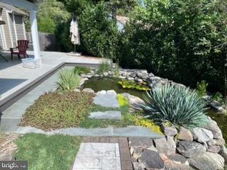 1607 Silverside Road Wilmington, DE 19810 - Photo 34 of 36 a view of a swimming pool with a yard