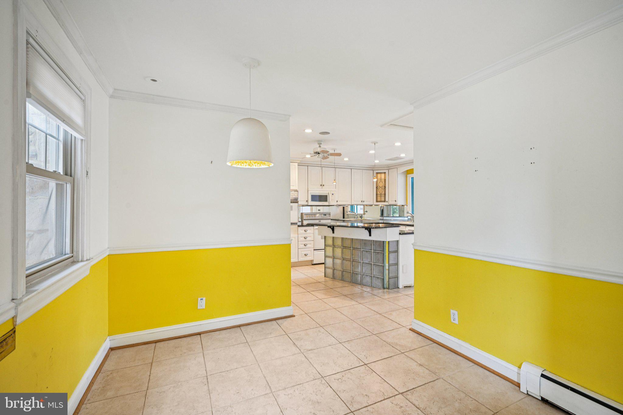 1607 Silverside Road Wilmington, DE 19810 - Photo 10 of 36 a view of a kitchen with table and chairs