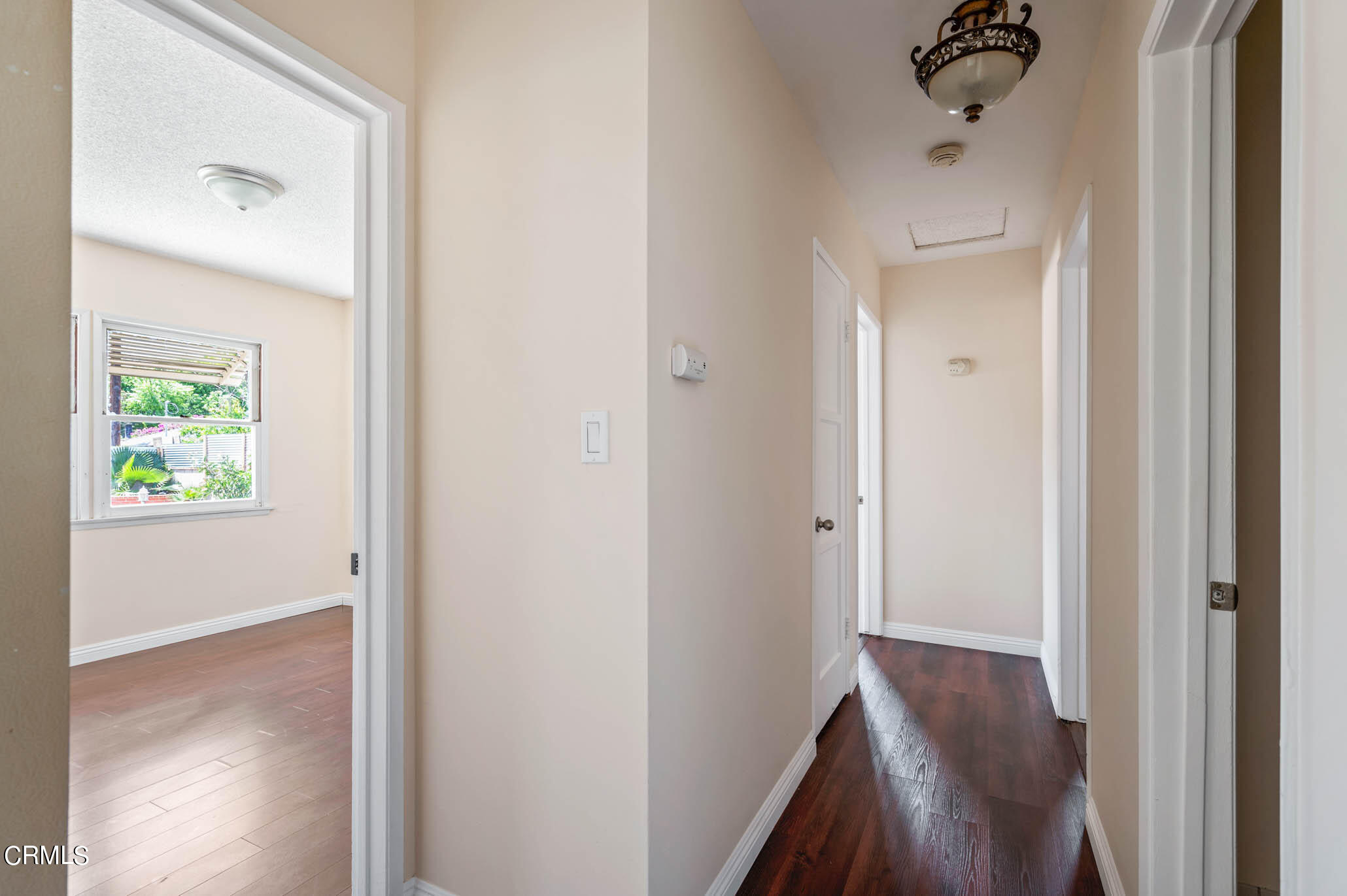 19406 Sherman Way Reseda, CA 91335 - Photo 12 of 36 a view of hallway with wooden floor