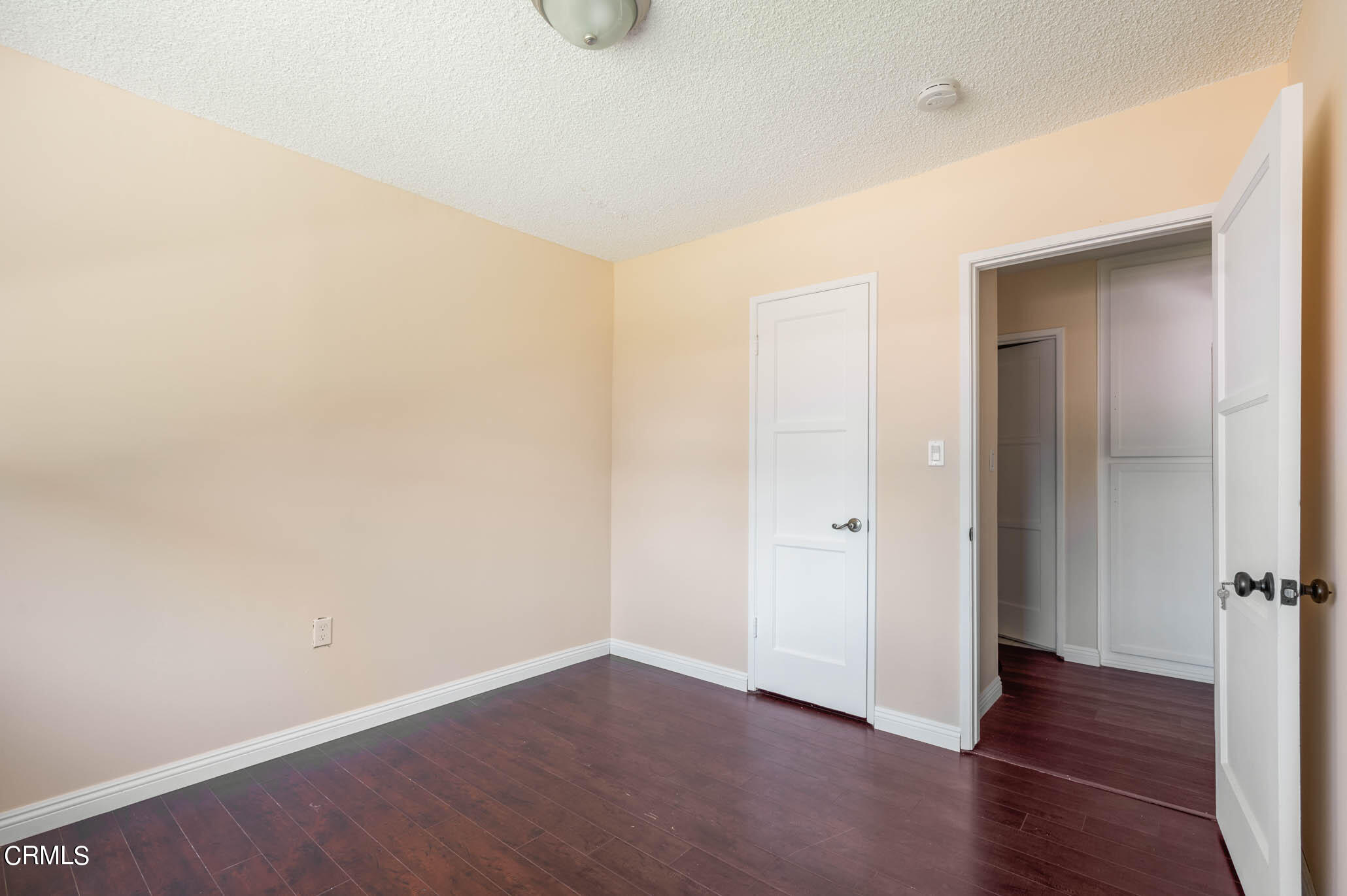 19406 Sherman Way Reseda, CA 91335 - Photo 14 of 36 a view of a room with wooden floor