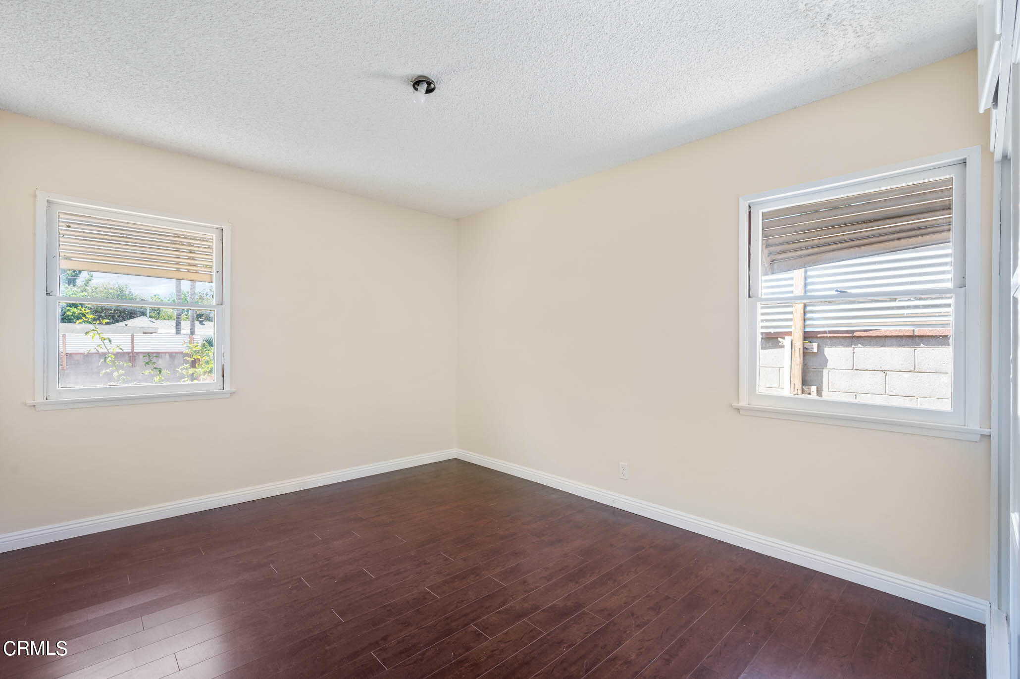 19406 Sherman Way Reseda, CA 91335 - Photo 17 of 36 an empty room with a window
