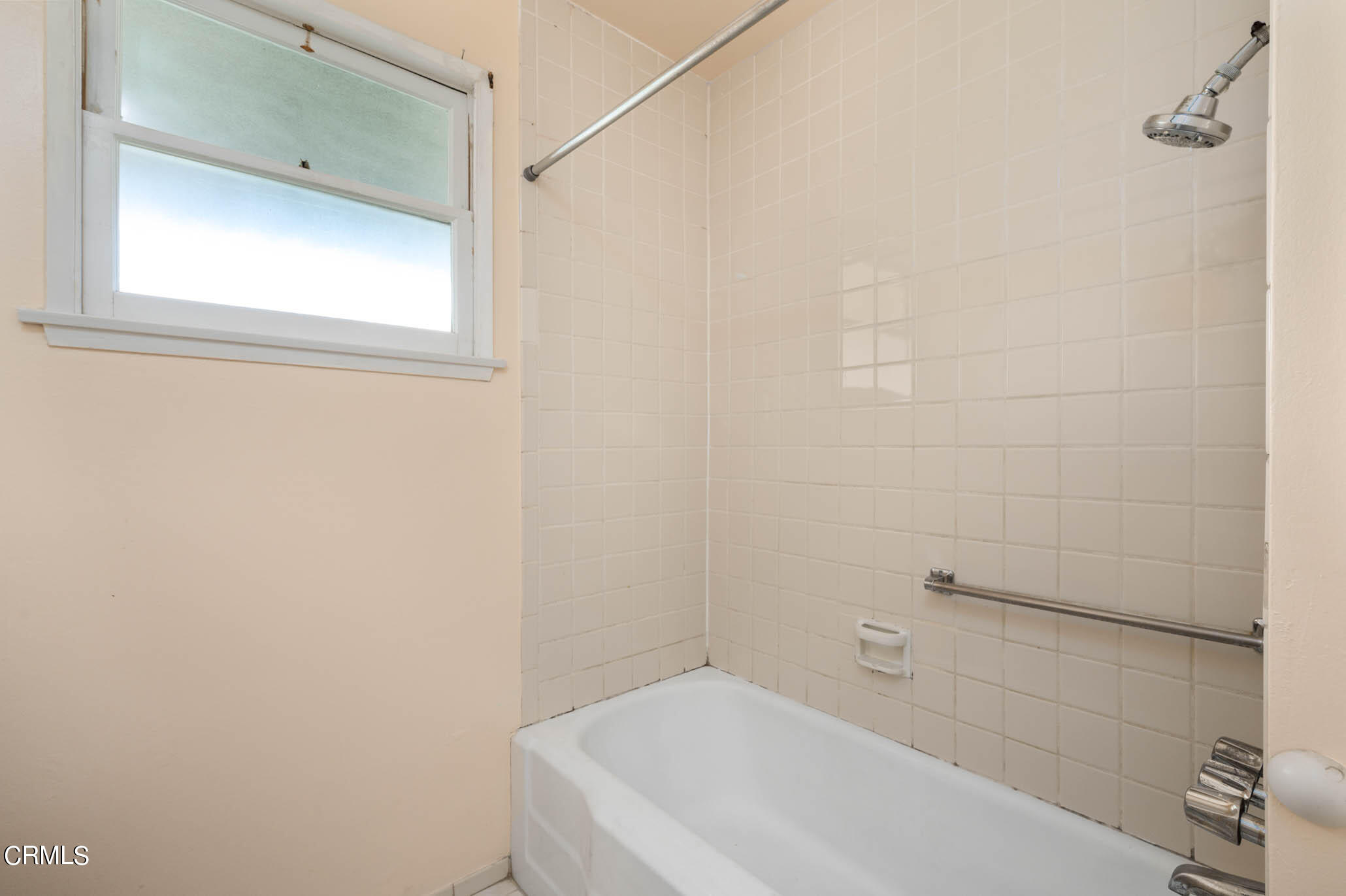 19406 Sherman Way Reseda, CA 91335 - Photo 20 of 36 a bathroom with a bathtub