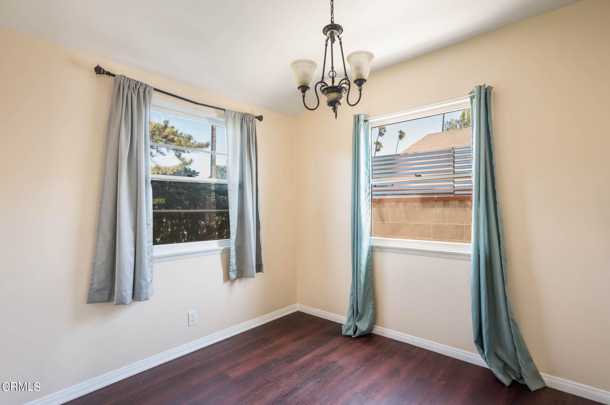 19406 Sherman Way Reseda, CA 91335 - Photo 21 of 36 a view of a hallway with wooden floor and cabinet