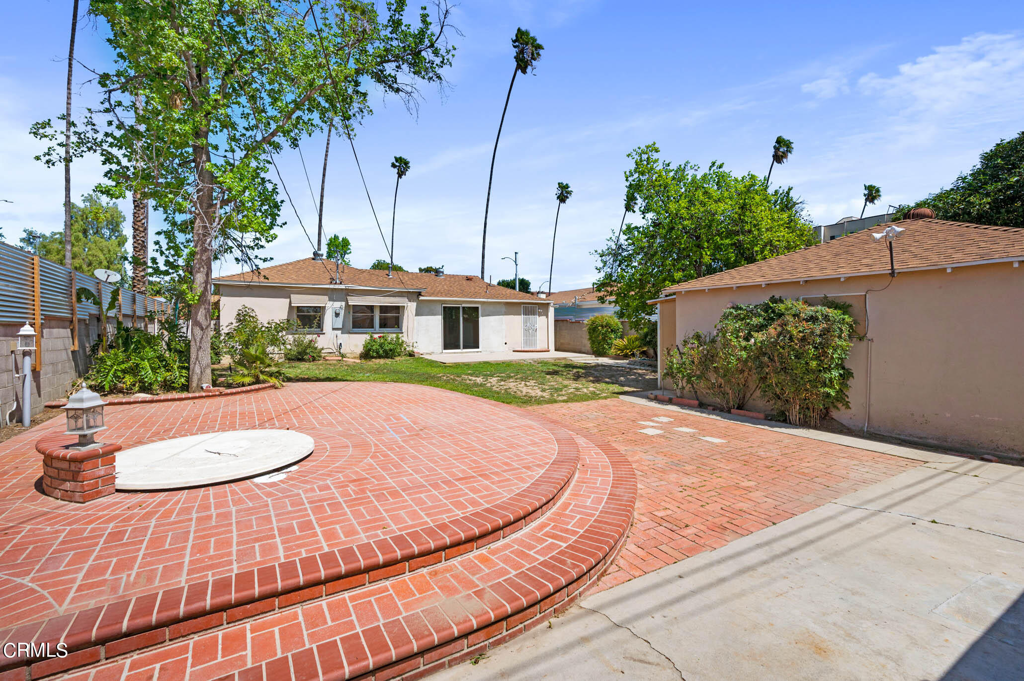 19406 Sherman Way Reseda, CA 91335 - Photo 32 of 36 a view of a house with a swimming pool