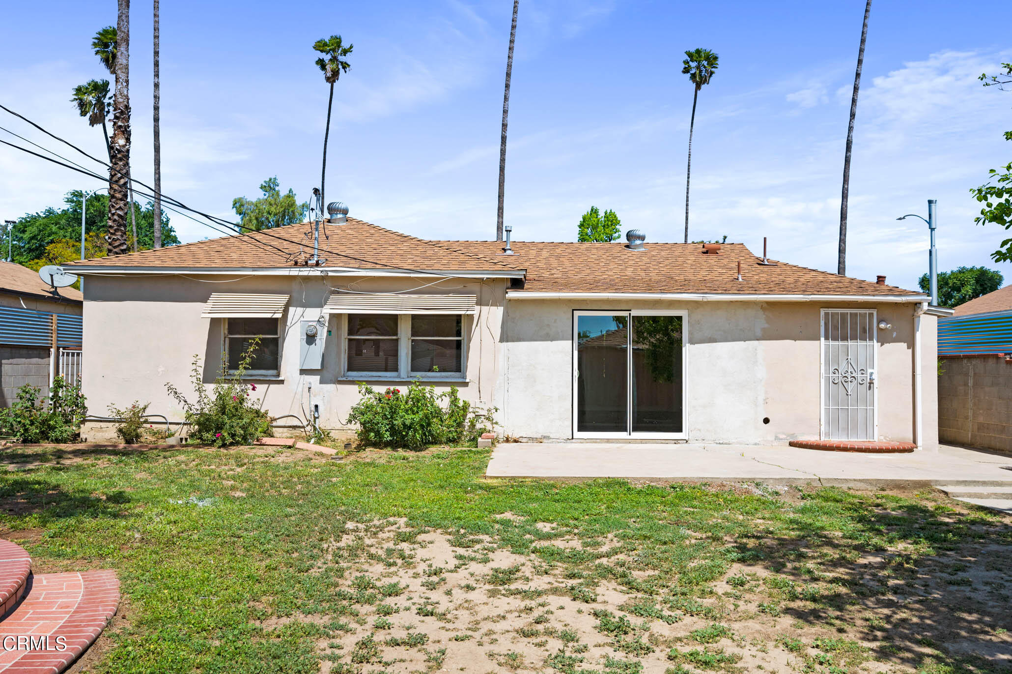 19406 Sherman Way Reseda, CA 91335 - Photo 33 of 36 a front view of a house with garden