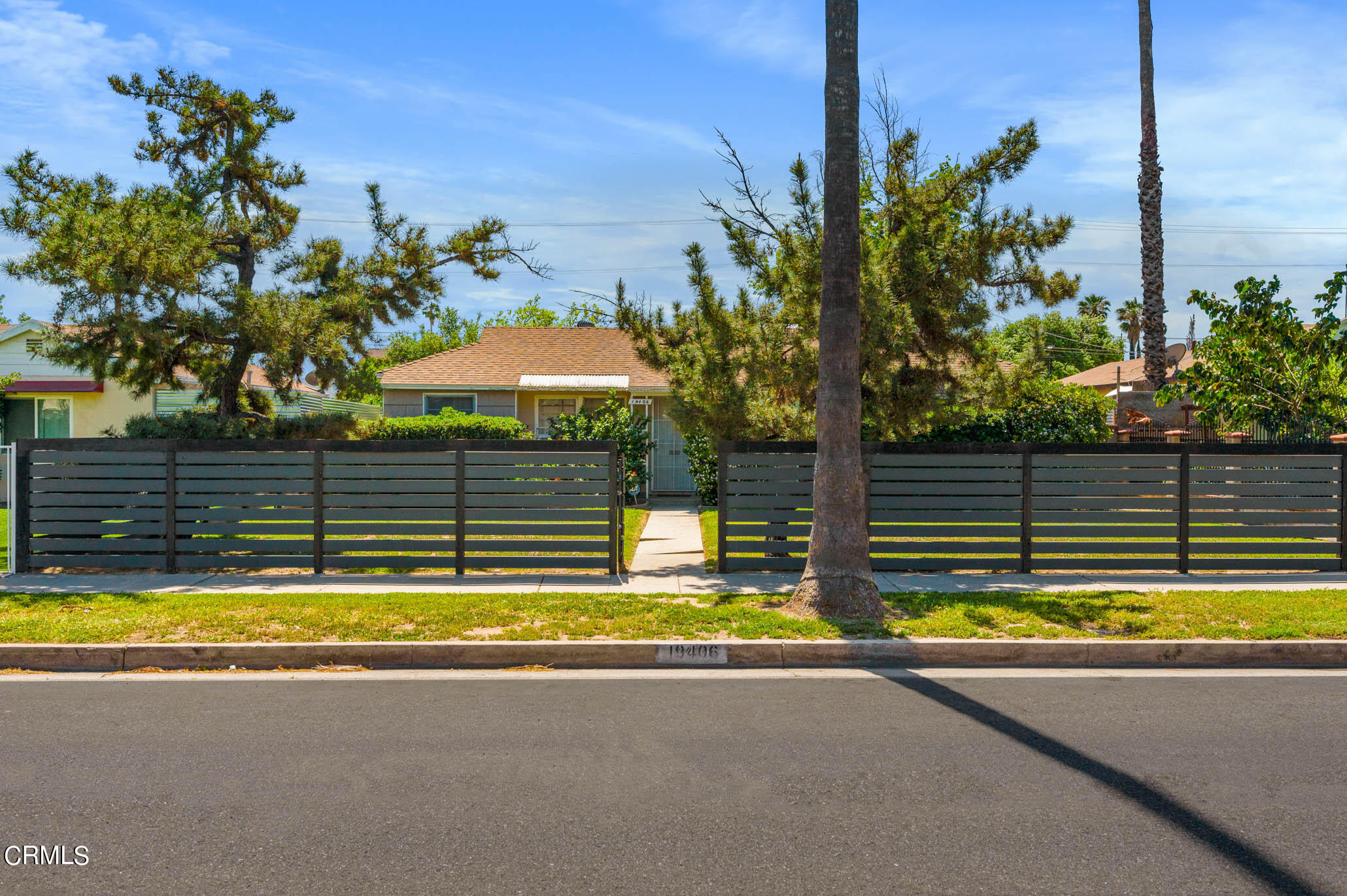 19406 Sherman Way Reseda, CA 91335 - Photo 5 of 36 a view of swimming pool with a yard