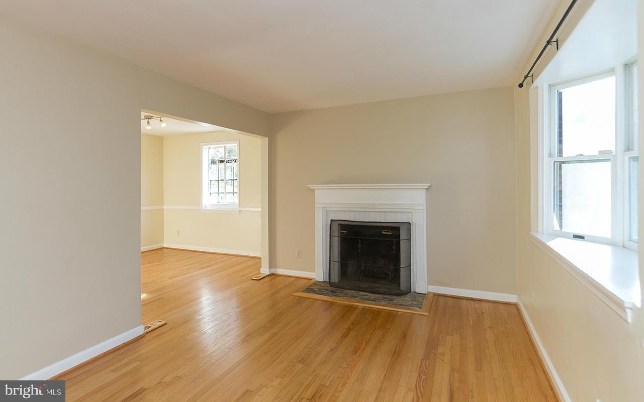 8103 Rider Avenue Baltimore, MD 21204 - Photo 15 of 30 Cozy living room w/wood burning fireplace