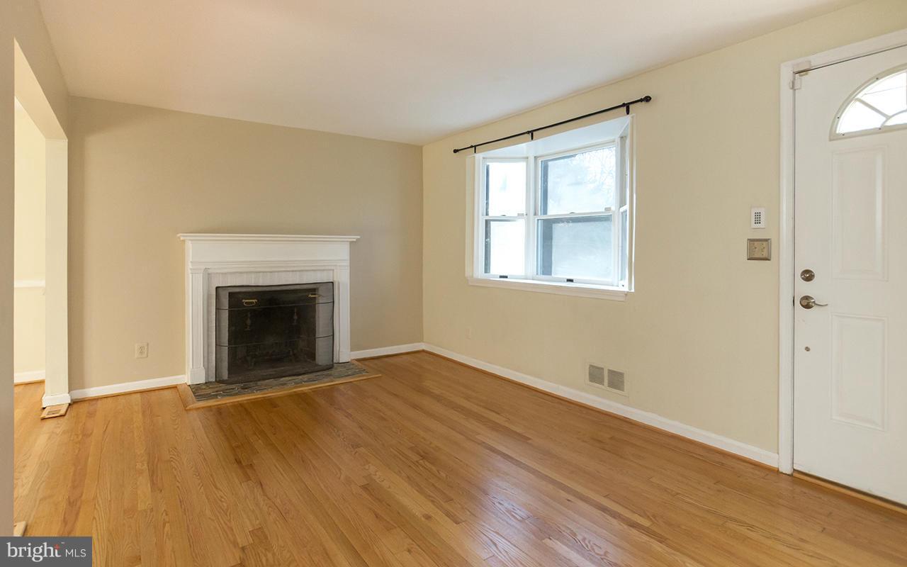 8103 Rider Avenue Baltimore, MD 21204 - Photo 3 of 30 Refinished hardwood floors & freshly painted